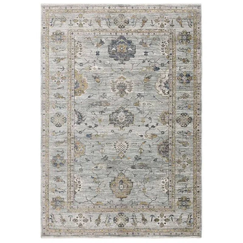 Grey traditional area rug with ornate floral pattern and detailed border design