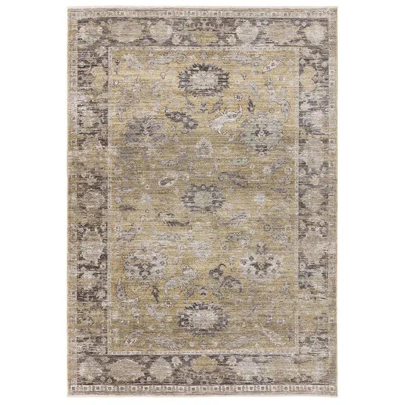 Vintage style area rug with muted grey and beige floral pattern and decorative border