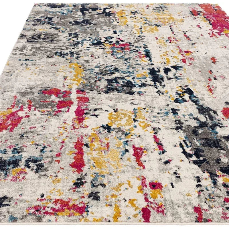 Modern area rug with abstract pattern in grey, yellow, pink, and blue tones