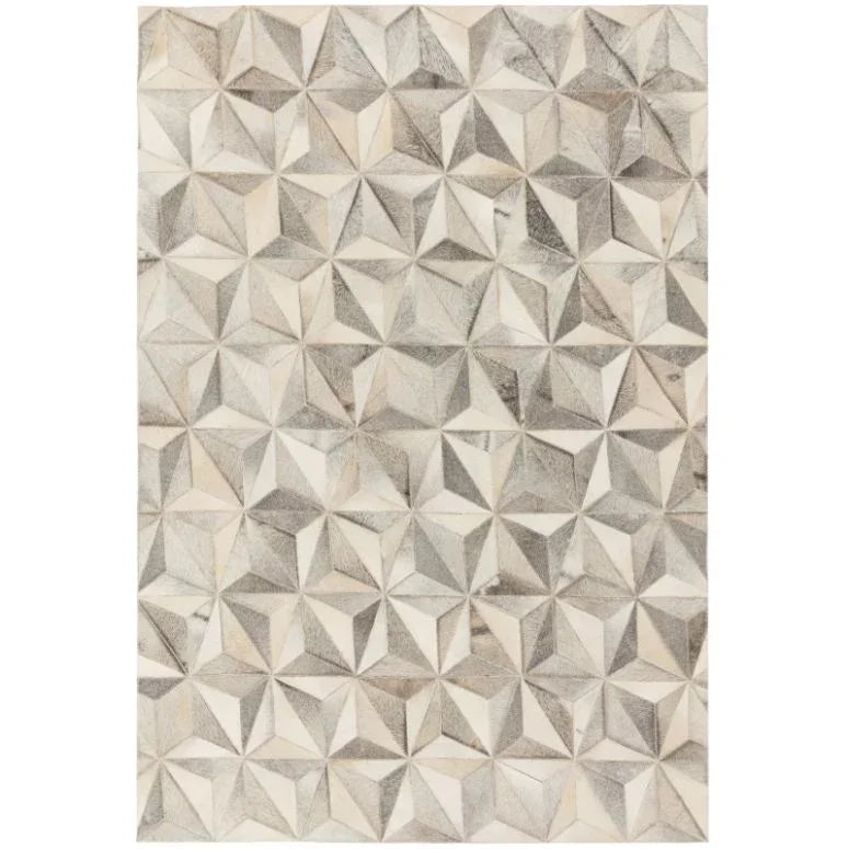 Neutral geometric area rug with diamond pattern and textured surface