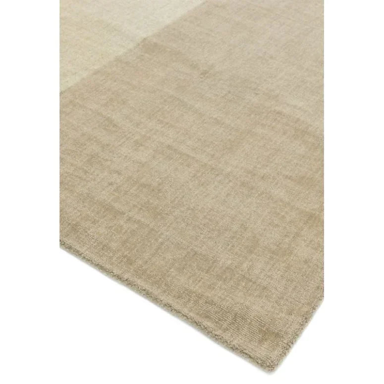Beige area rug with subtle texture and clean edge, shown on a white background
