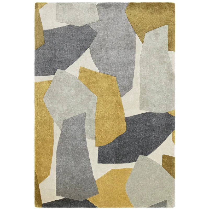 Modern area rug with abstract geometric shapes in grey, mustard and cream tones