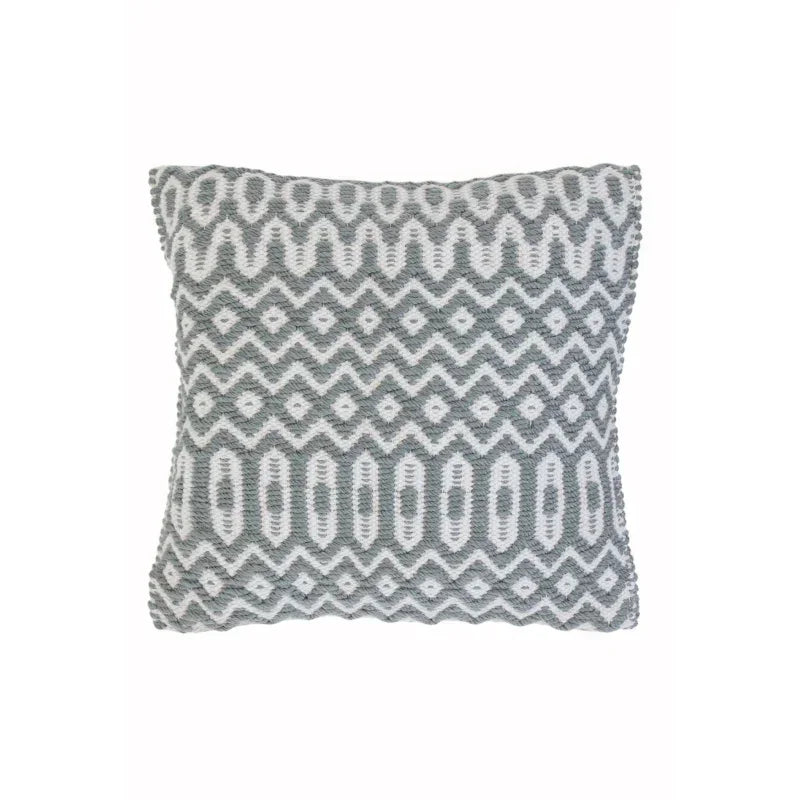 Grey and white patterned cushion with geometric zigzag design