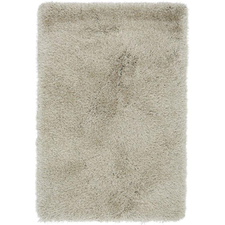 Rectangular beige shaggy rug with thick pile and soft texture