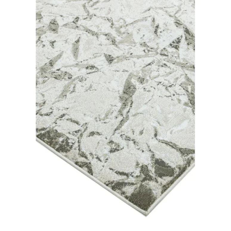 Grey and white area rug with marble abstract pattern, corner angle view