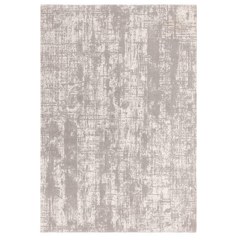 Grey and cream abstract area rug with textured pattern