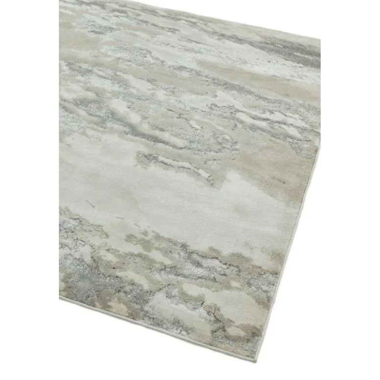 Modern area rug with grey and beige abstract pattern, angled corner view