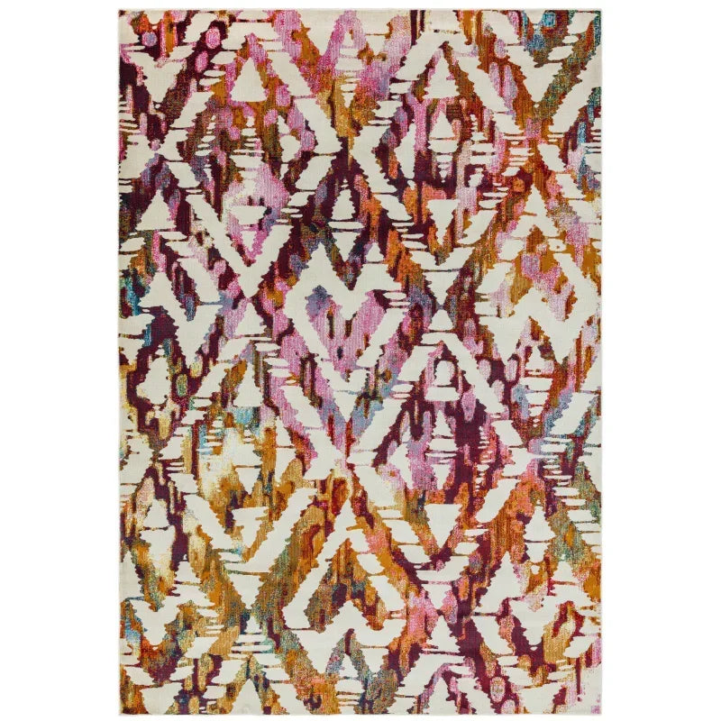 Multicoloured patterned rug with abstract geometric shapes on cream background