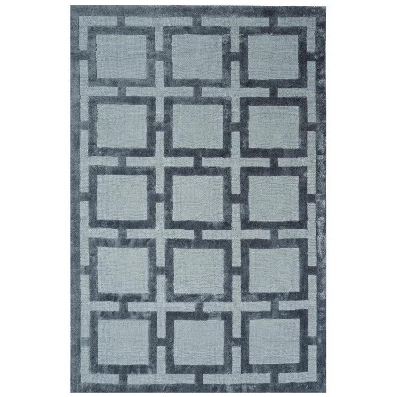 Grey geometric patterned rug with interlocking square design