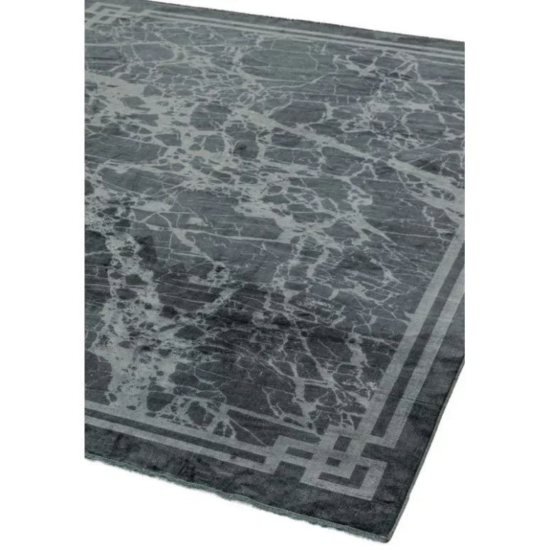 Grey marble effect area rug with geometric border design