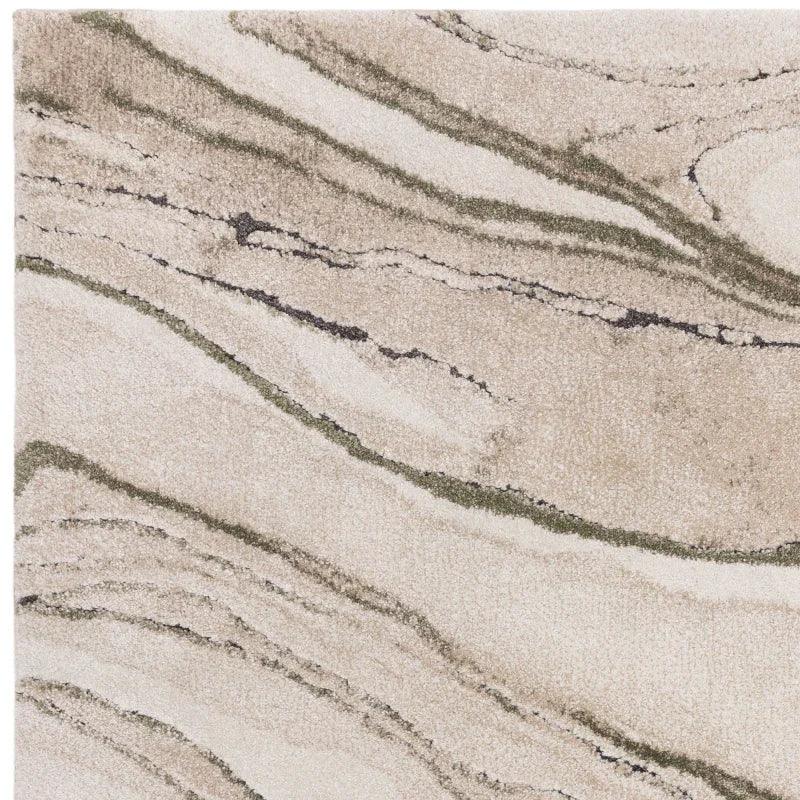 Beige area rug with abstract wavy pattern and textured pile
