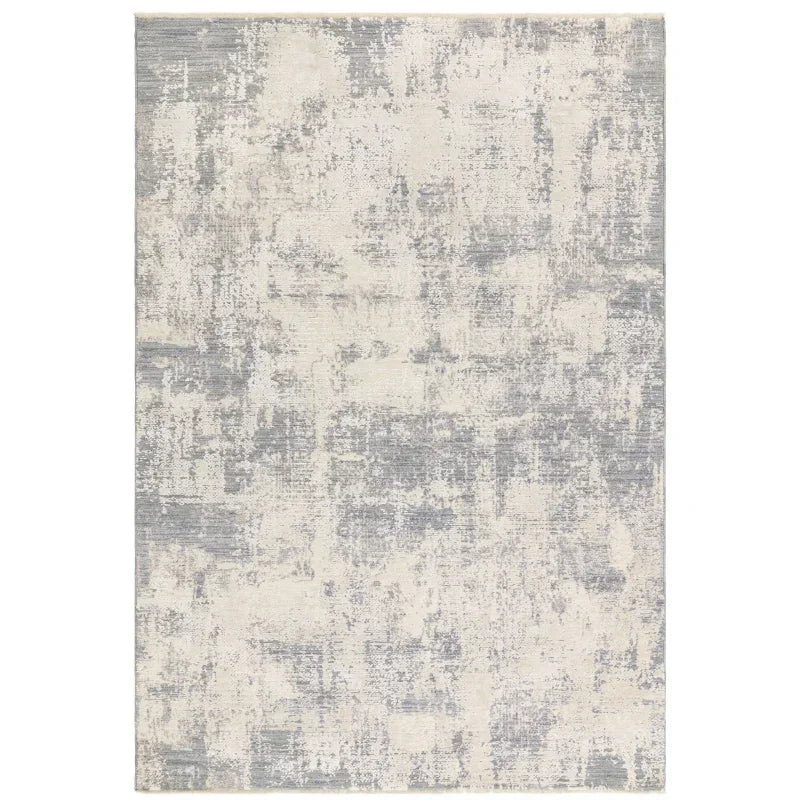Modern area rug with abstract grey and cream pattern, rectangular shape
