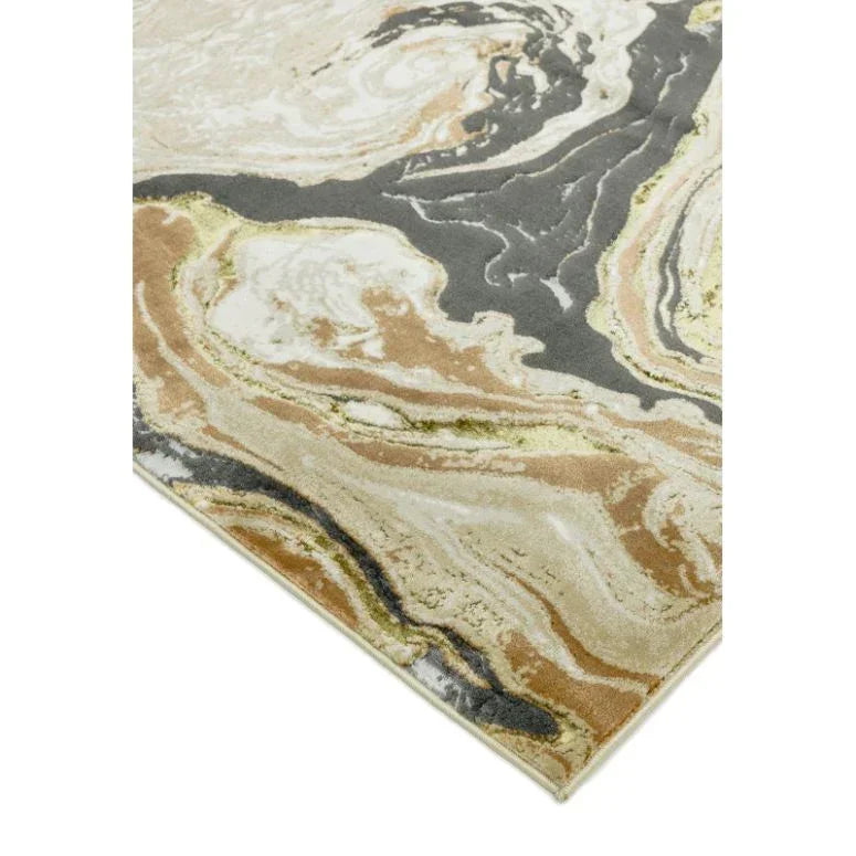 Abstract swirl pattern area rug in beige, cream, and grey colors, corner angle view