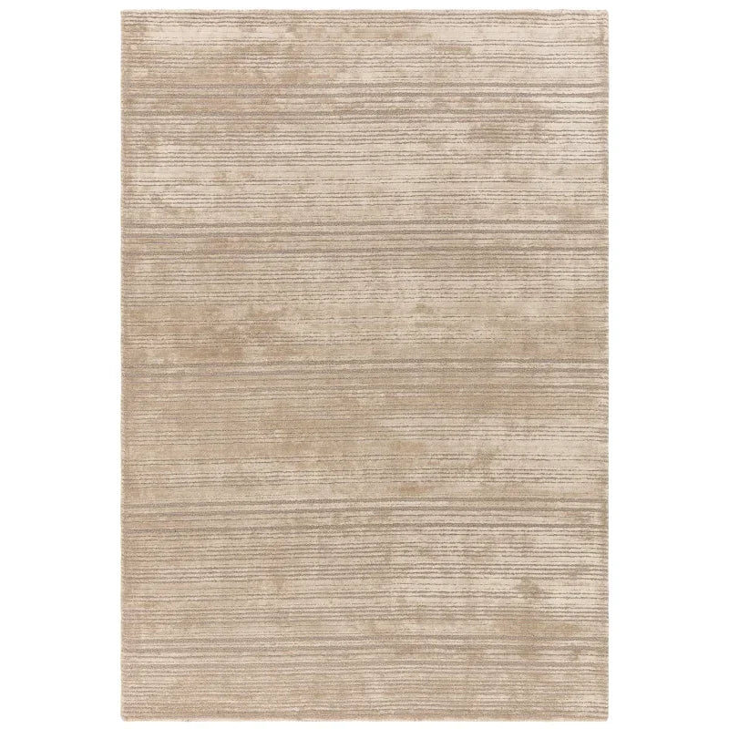Beige area rug with subtle horizontal striped pattern and soft texture, shown from above