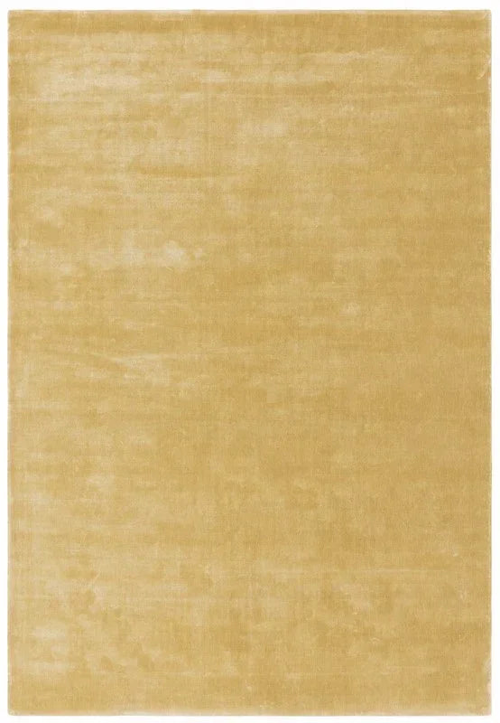 Rectangular beige area rug with soft, plain pile and subtle sheen, shown from above