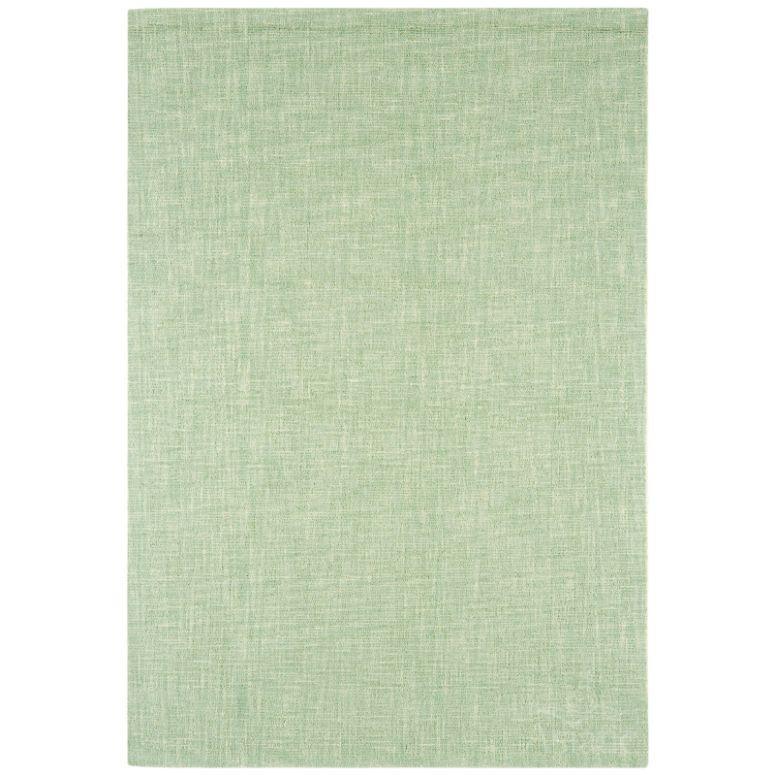 Green area rug with subtle textured pattern and soft woven fabric, shown from above