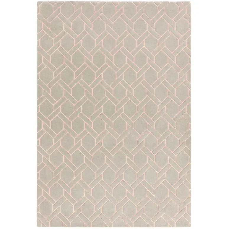 Modern area rug with light beige geometric pattern on a soft grey background