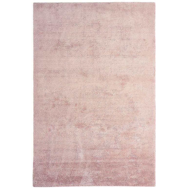 Blush pink area rug with soft pile and subtle textured finish, rectangular shape