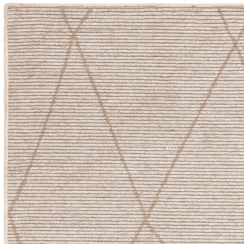 Beige area rug with subtle geometric line pattern and textured woven material