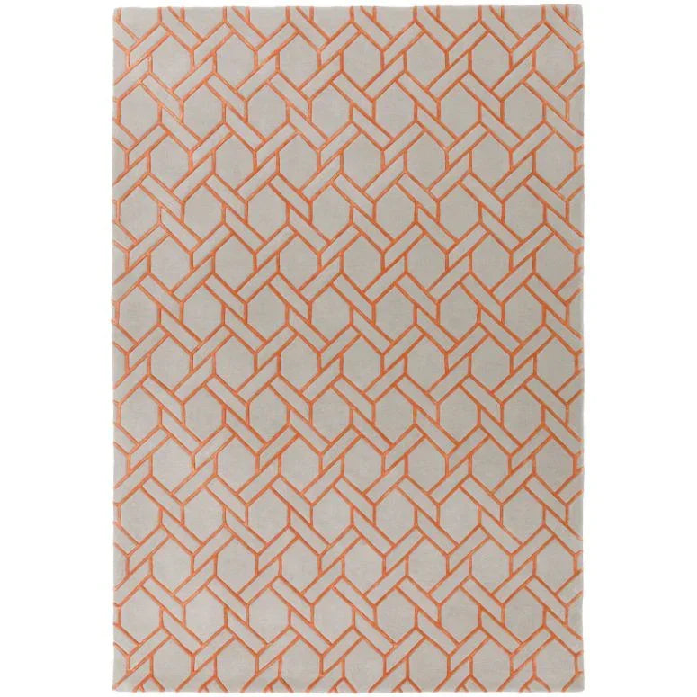 Geometric patterned rug with orange lines on a light beige background