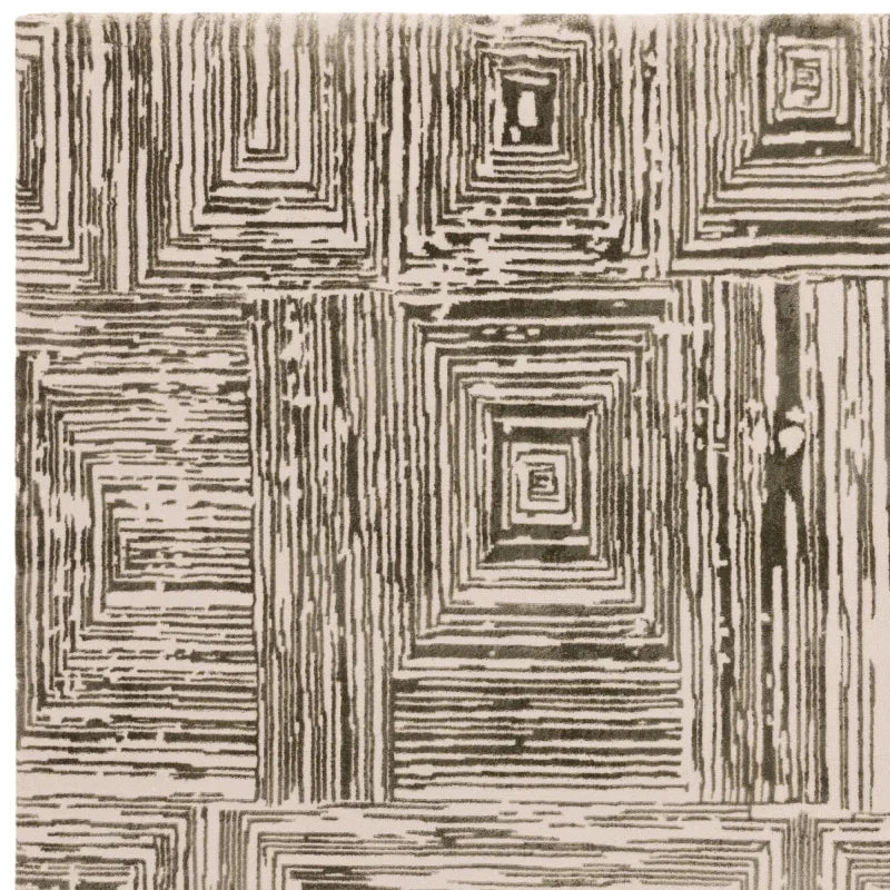 Neutral geometric area rug with textured square pattern in beige and grey tones
