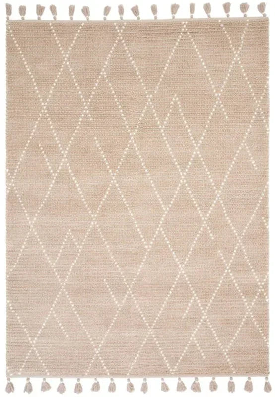 Beige geometric rug with diamond pattern and tassel edges, flat lay view