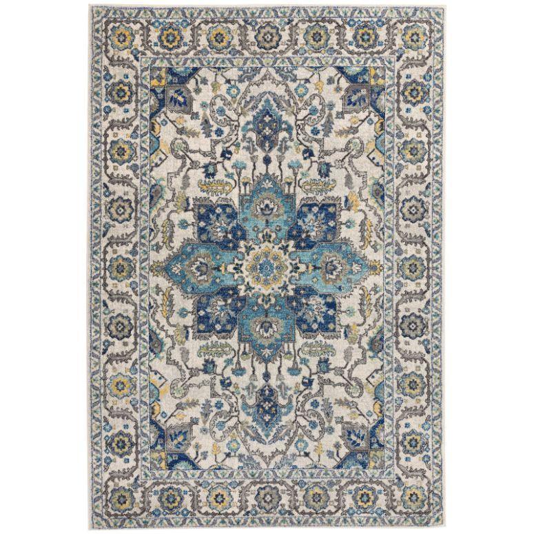 Blue and ivory oriental patterned area rug with floral medallion and decorative border