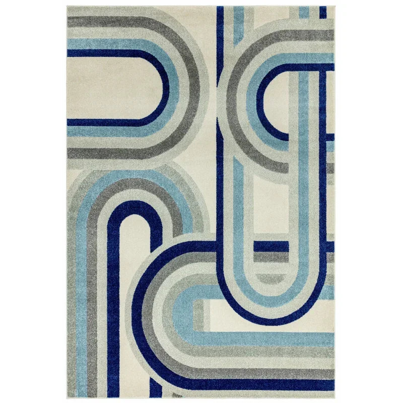 Modern area rug with geometric blue, grey, and cream curved line pattern