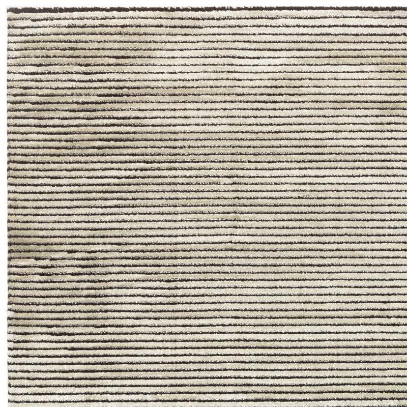 Beige and brown striped rug with textured pile and horizontal lines