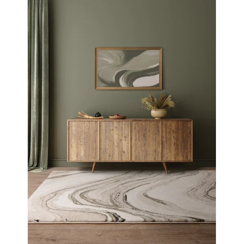 Modern wooden sideboard on oak floor with abstract area rug and decorative vases