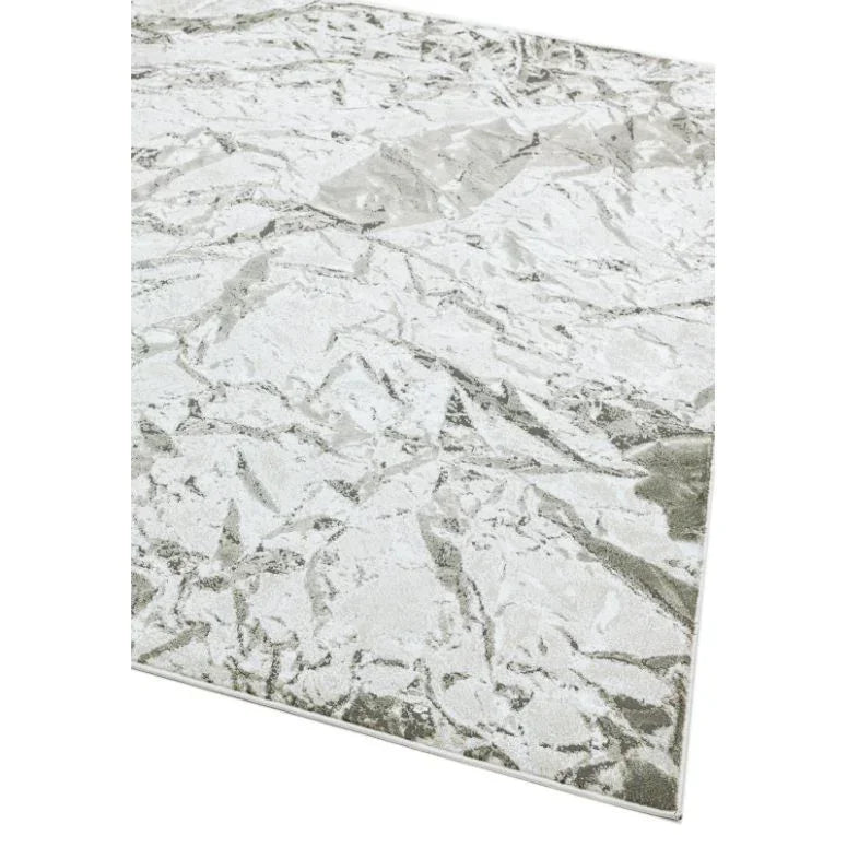 Silver abstract rug with textured geometric pattern, angled corner view