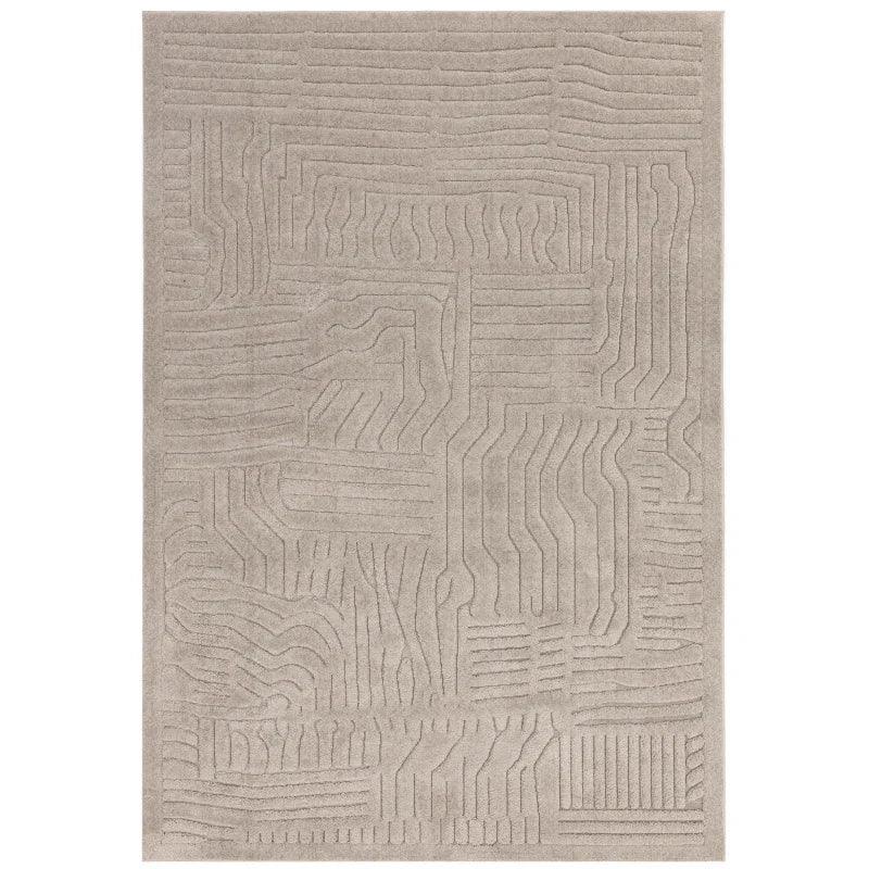 Beige area rug with raised geometric pattern and textured surface
