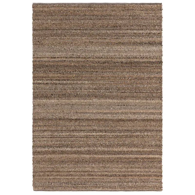 Rectangular brown striped area rug with textured pile