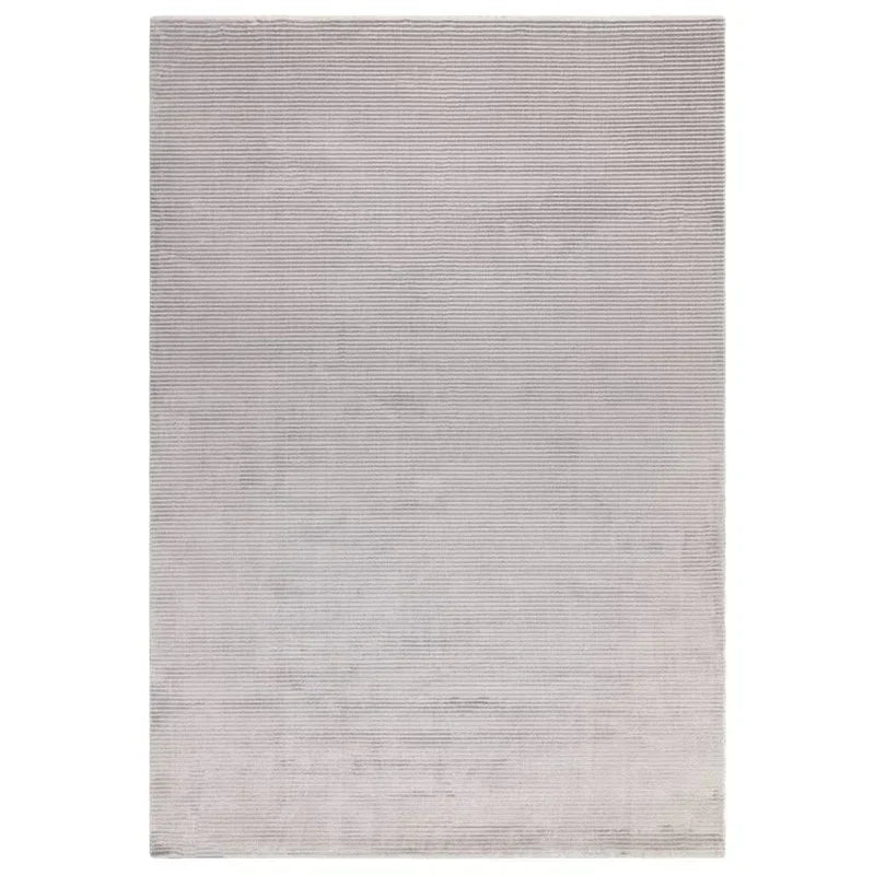 Light grey textured area rug with subtle striped pattern and soft surface
