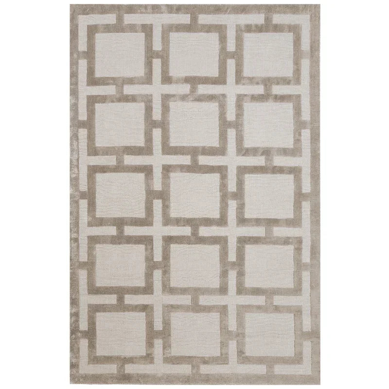 Beige geometric patterned area rug with square and cross design