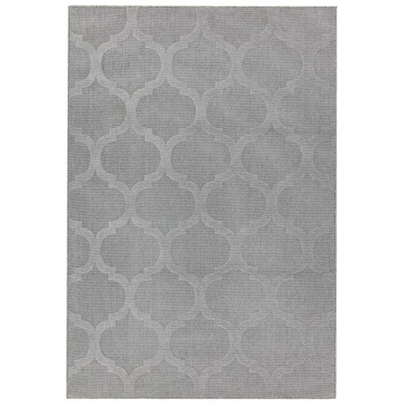 Light grey area rug with subtle geometric trellis pattern and flat weave texture