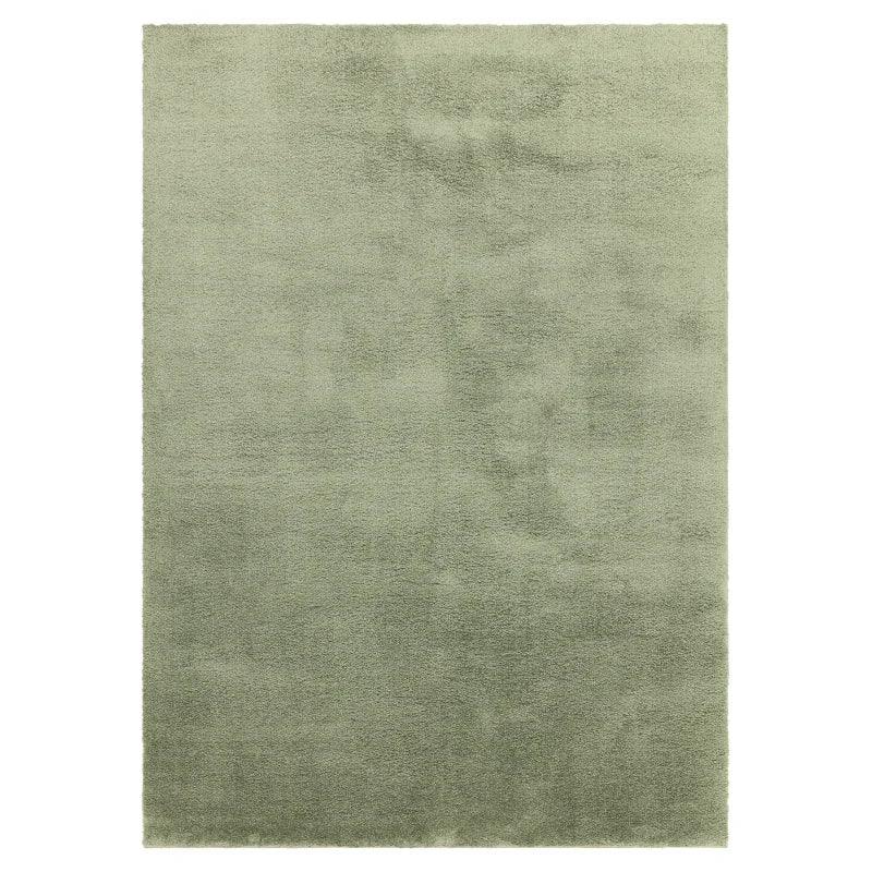Sage green area rug with soft texture and rectangular shape