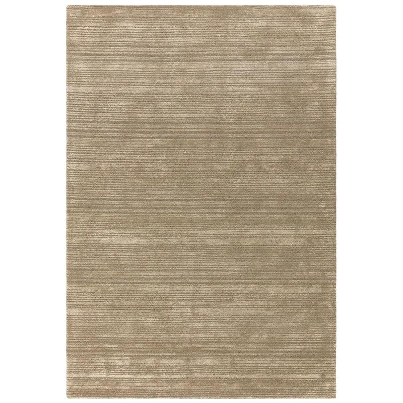 Beige area rug with subtle horizontal textured lines and soft finish