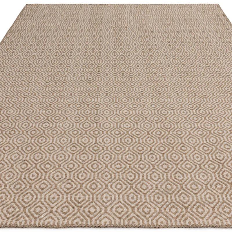 Beige geometric patterned area rug with textured weave