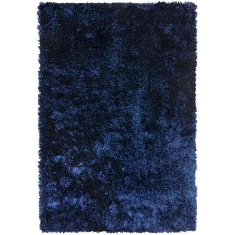 Navy blue shaggy rug with thick pile and soft texture, top view