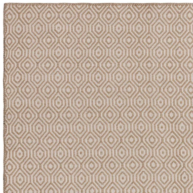 Beige geometric pattern rug with diamond design and textured weave