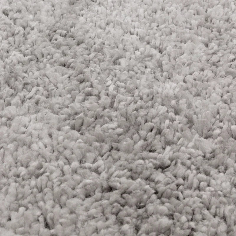 Closeup of soft grey shaggy carpet texture