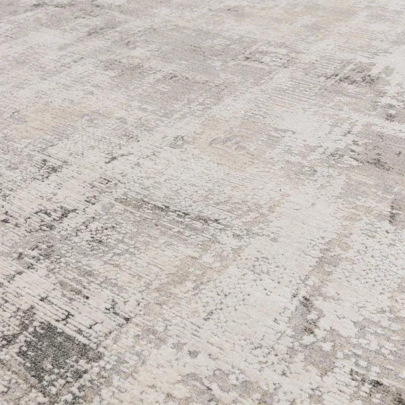 Modern abstract area rug in cream and grey tones with textured pattern