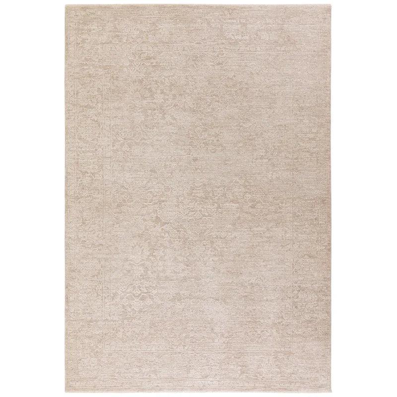 Beige area rug with subtle textured pattern and classic decorative border
