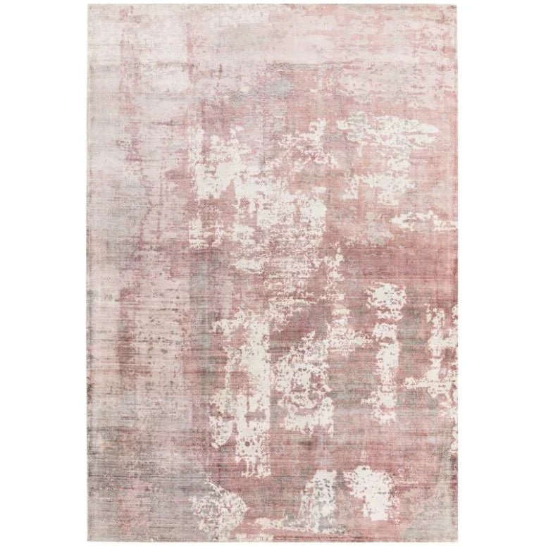 Pink and cream abstract area rug with textured pattern and soft finish