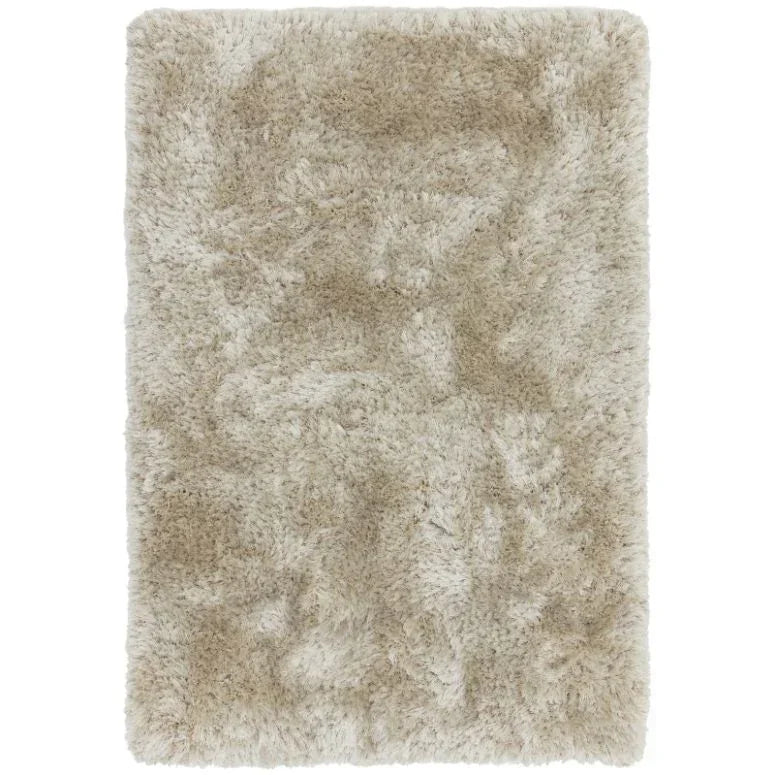 Beige shaggy area rug with thick pile and soft texture