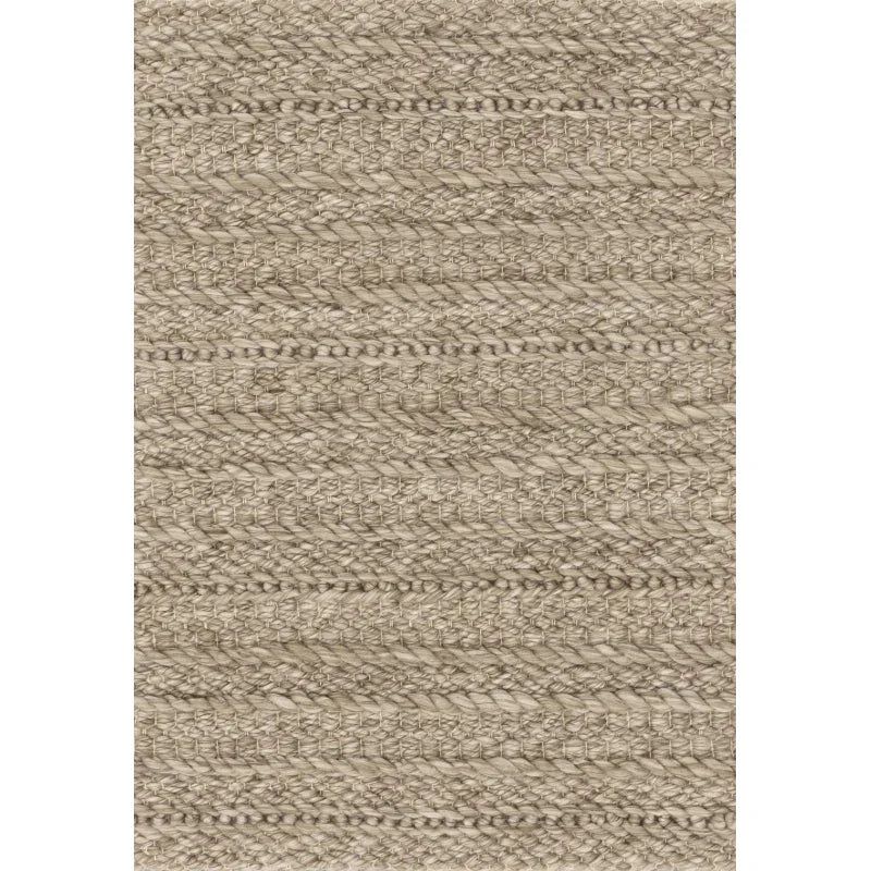 Beige braided wool area rug with textured woven pattern