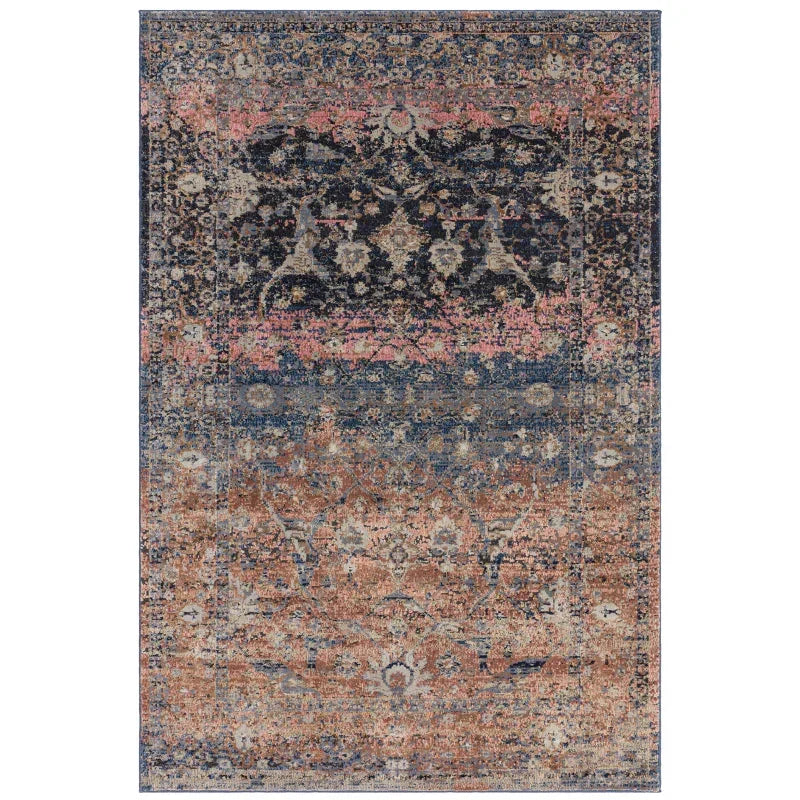 Vintage patterned area rug with distressed blue, pink, and beige design