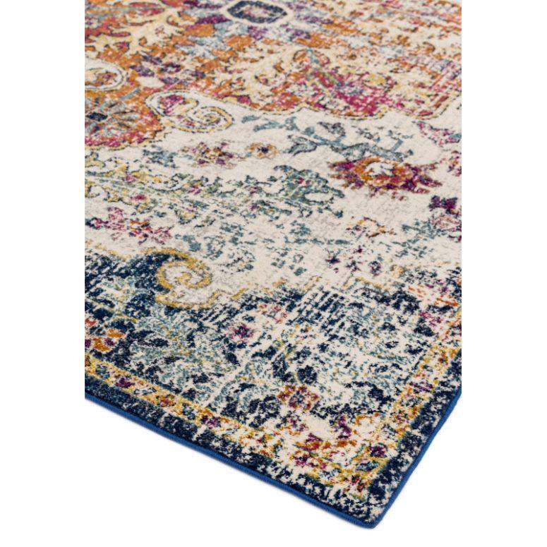 Multicolour patterned area rug with distressed effect and blue corner border
