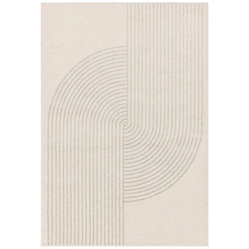 Cream area rug with modern linear geometric pattern and curved lines